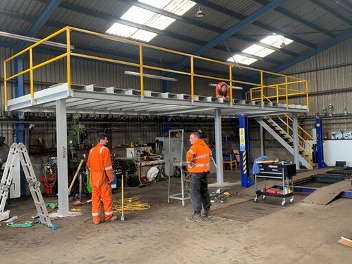 Mezz floor with stair for car garage.JPG