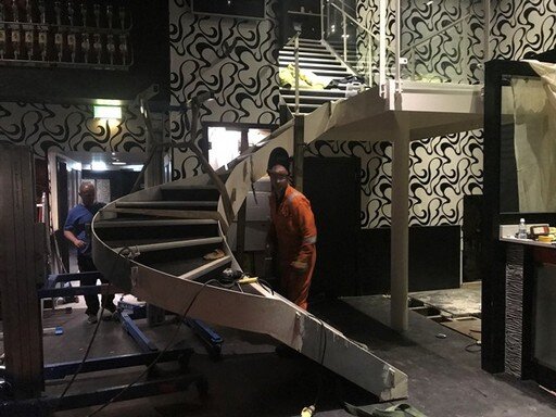 Moving staircase in night club.JPG